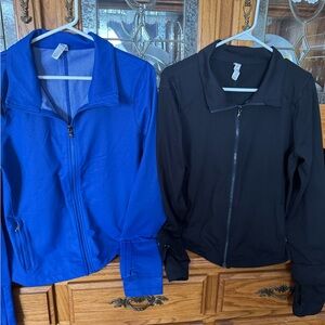 Lot of 2 Under Armour Ladies jackets.  Size XL but fits like a large.